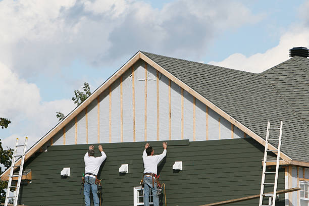 Professional Vinyl Siding technician working in Spraggs, PA